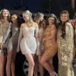 Group celebrating in a luxury party bus in Denver