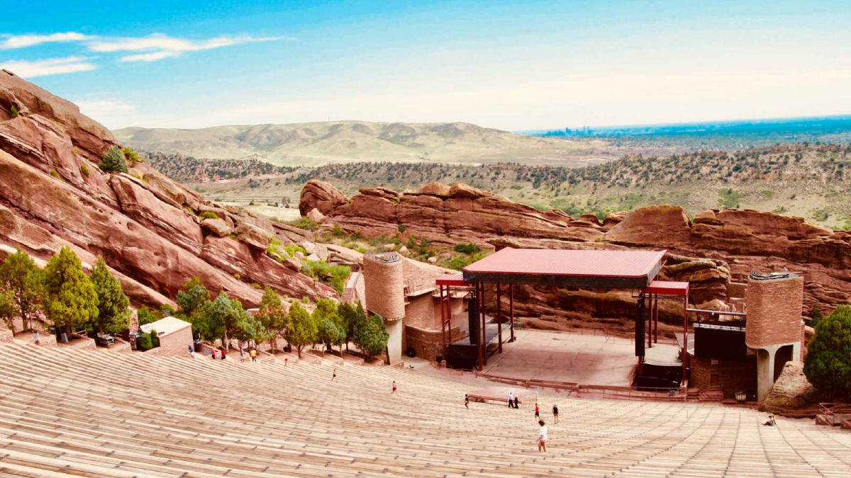 Luxury shuttle driving from Colorado Springs to Red Rocks Amphitheater