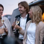 Group arriving in a luxury party bus for a team building event in Denver
