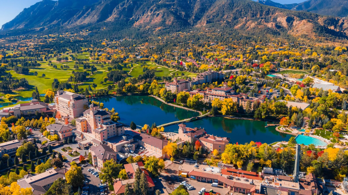 Luxury limousine traveling from Denver Airport toward Colorado Springs